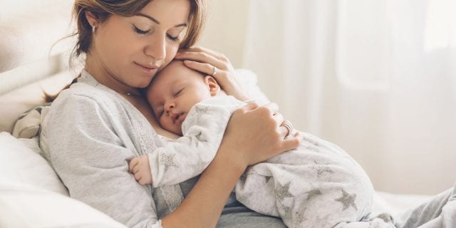 Mom Holding Newborn