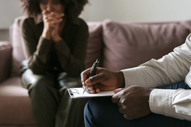 person-sharing-feelings-emotions-therapy-session