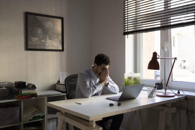 side-view-anxious-man-working