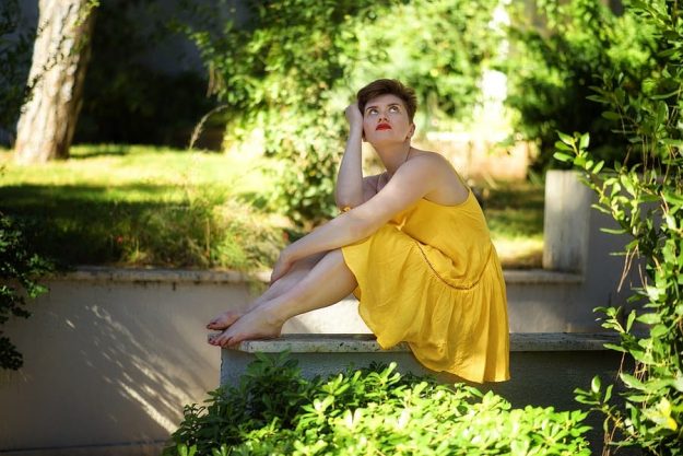 Depressed Woman in Yellow Dress