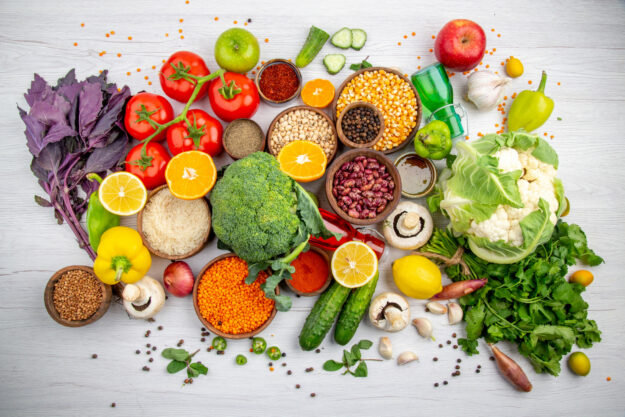 top-view-fresh-foods-spices-vegetables-cooking-white-table Proper nutrition can make a big difference in your mental health