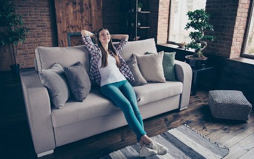 Woman Relaxing on Couch