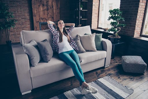 Woman Relaxing on Couch