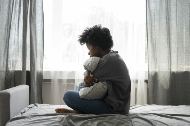 young-depressed-adult-home children with depression